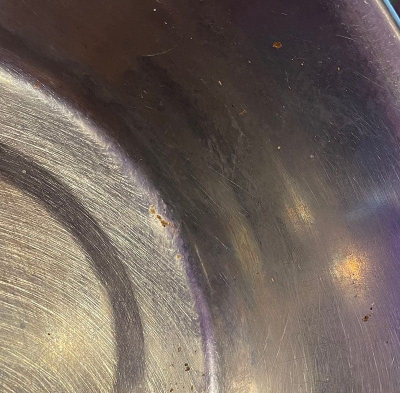 Stainless Steel Dog Bowl That Needs Cleaning